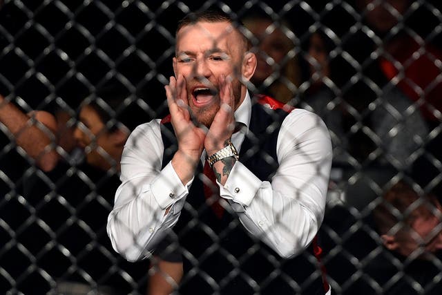 McGregor was watching his friend when he jumped into the cage