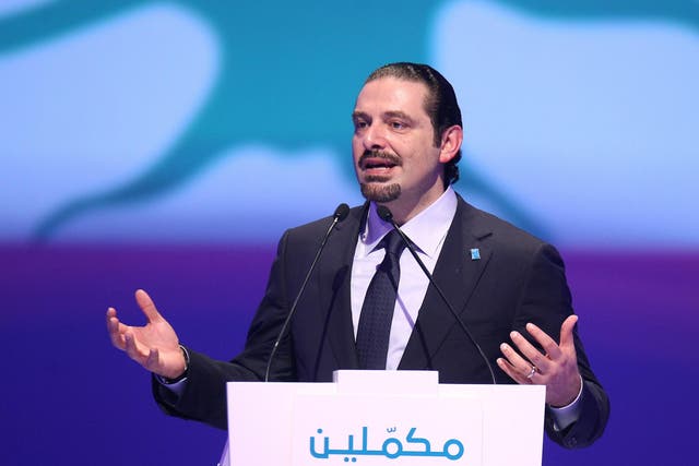 Lebanese Prime Minister Saad Hariri delivers a speech to mark the tenth anniversary of the assassination of his father and former prime minister Rafiq Hariri, on 14 February 2015, at the Biel Convention Centre in Beirut