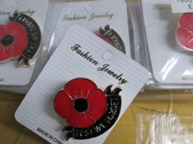 Border Force officers seized fake poppy branded jewellery, key rings and scarves estimated to be worth approximately £150,000