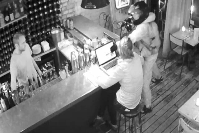 The moment an armed moped raider enters Bar Esteban in Crouch End, north London and attempts to steal a laptop from the restaurants bar. Customers at the restaurant fought off the would-be robber with bar stools.