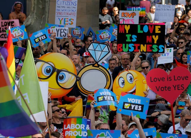 People attend a rally for marriage equality of same-sex couples in Sydney