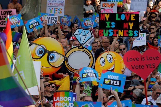 People attend a rally for marriage equality of same-sex couples in Sydney
