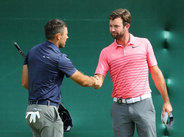 Scott Jamieson shakes hands with Charl Schwartzel