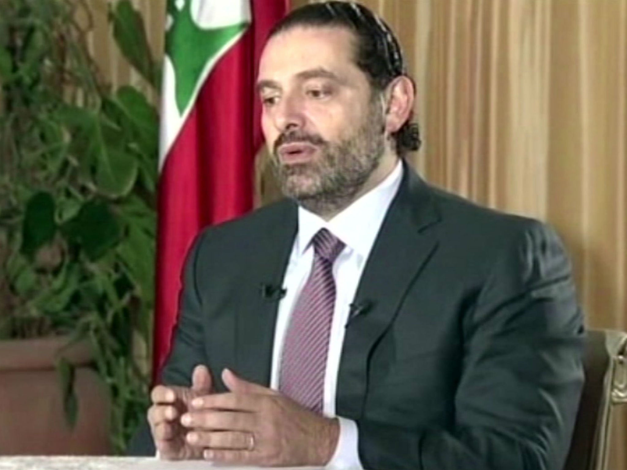 Lebanon’s Prime Minister Saad Hariri gives a live TV interview in Riyadh, Saudi Arabia