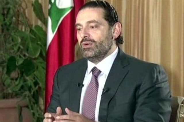 Lebanon’s Prime Minister Saad Hariri gives a live TV interview in Riyadh, Saudi Arabia