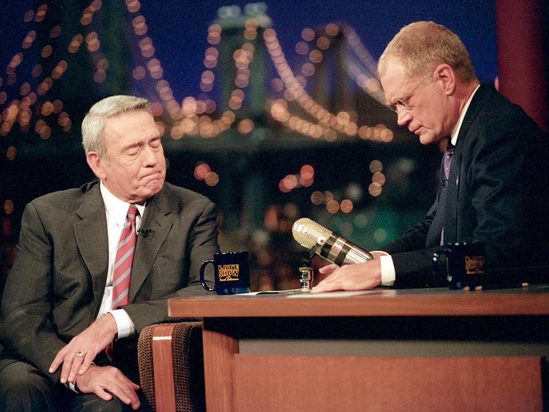 Dan Rather is comforted by host David Letterman on 17 September 2001 after Rather was overcome by emotion while discussing the World Trade Center and Pentagon attacks in a famous moment from his broadcasting career