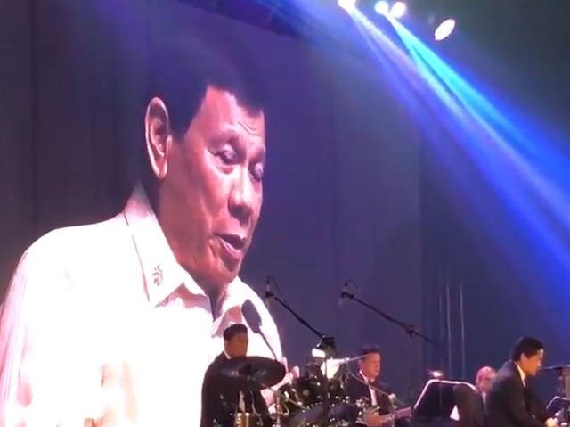 President Duterte sings a duet at the ASEAN gala dinner