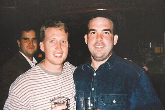 O'Neil McGean, right, and former partner Brian Betts, a popular DC principal who was killed in 2010, in the mid-1990s. Both were later murdered in two separate crimes, years apart