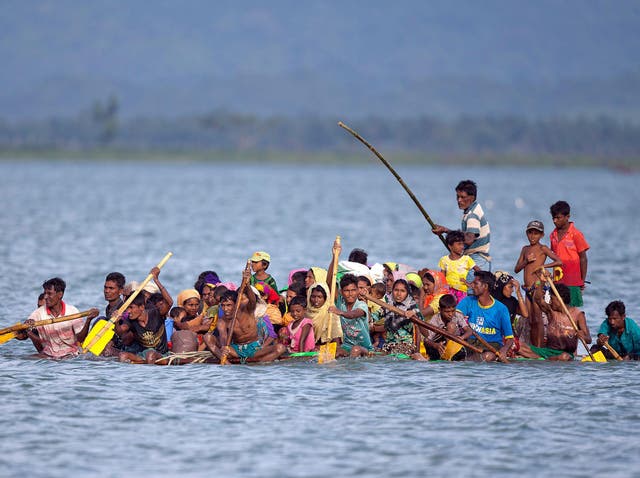 Rohingya Muslims who have fled to Bangladesh on makeshift rafts have accused the Burmese military of murder and rape