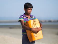 Teenage Rohingya boy floats on oil drum across sea to Bangladesh