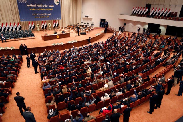 Members of the Iraqi parliament gather to vote on Iraq's new government