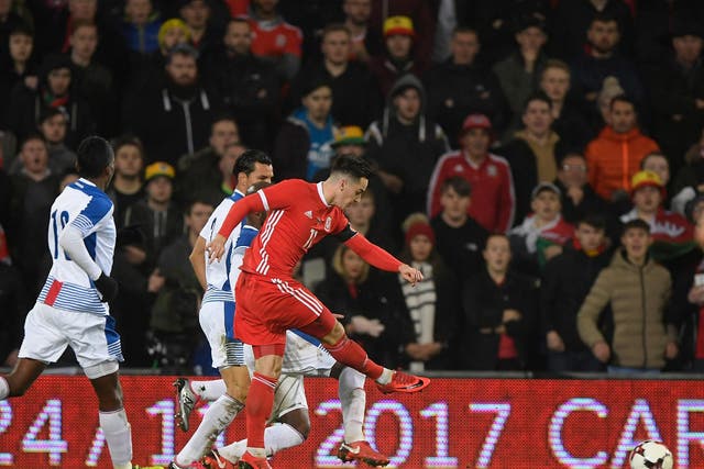 Tom Lawrence puts Wales in front with a powerful low strike