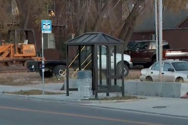 The bus stop where the jogger ran to after he was stabbed
