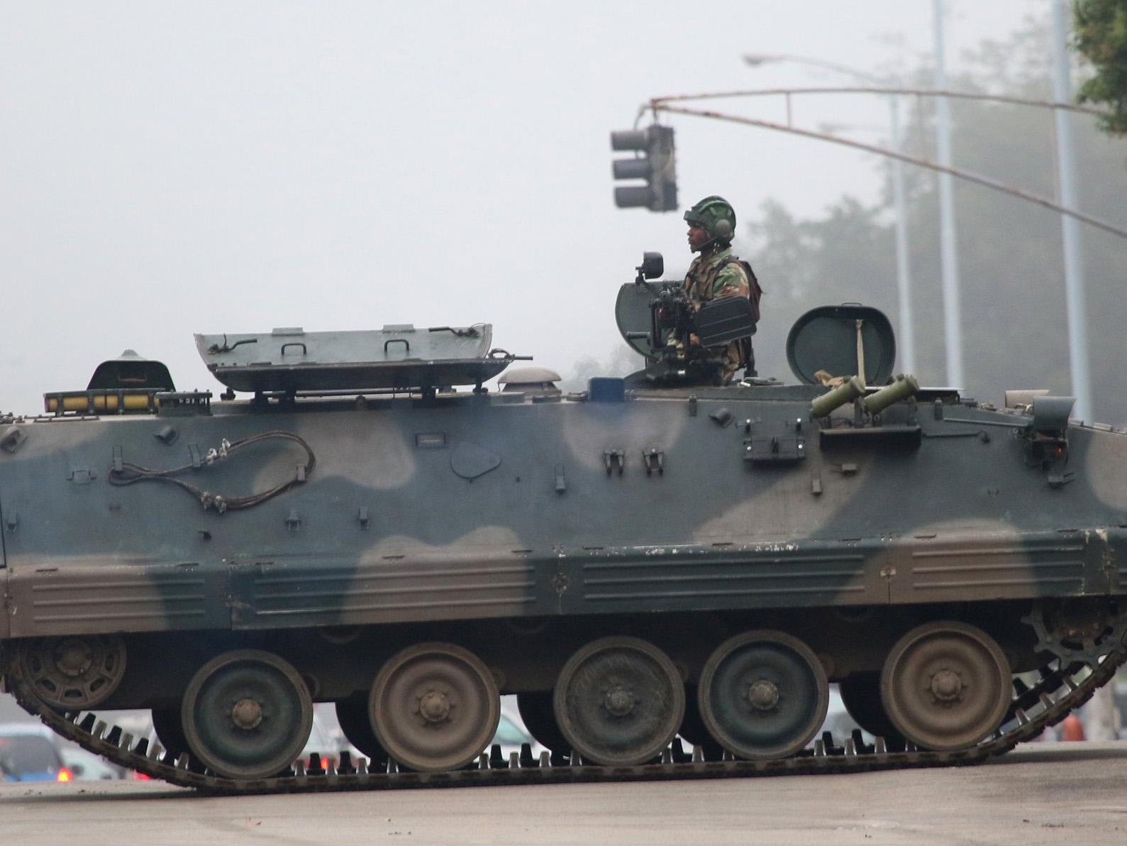 An army tanker blocks the main road to Parliament building in Harare after the Zimbabwe National Army (ZNA) has reportedly taken control over the government of President Robert Mugabe