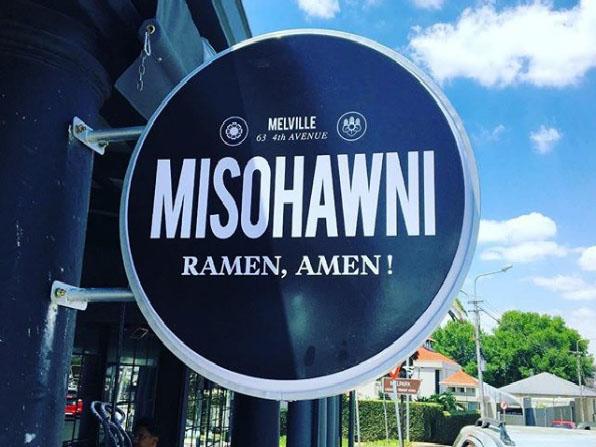 A white restaurant owner has defended using a racist, sexist slur as the name of his new eatery in South Africa.