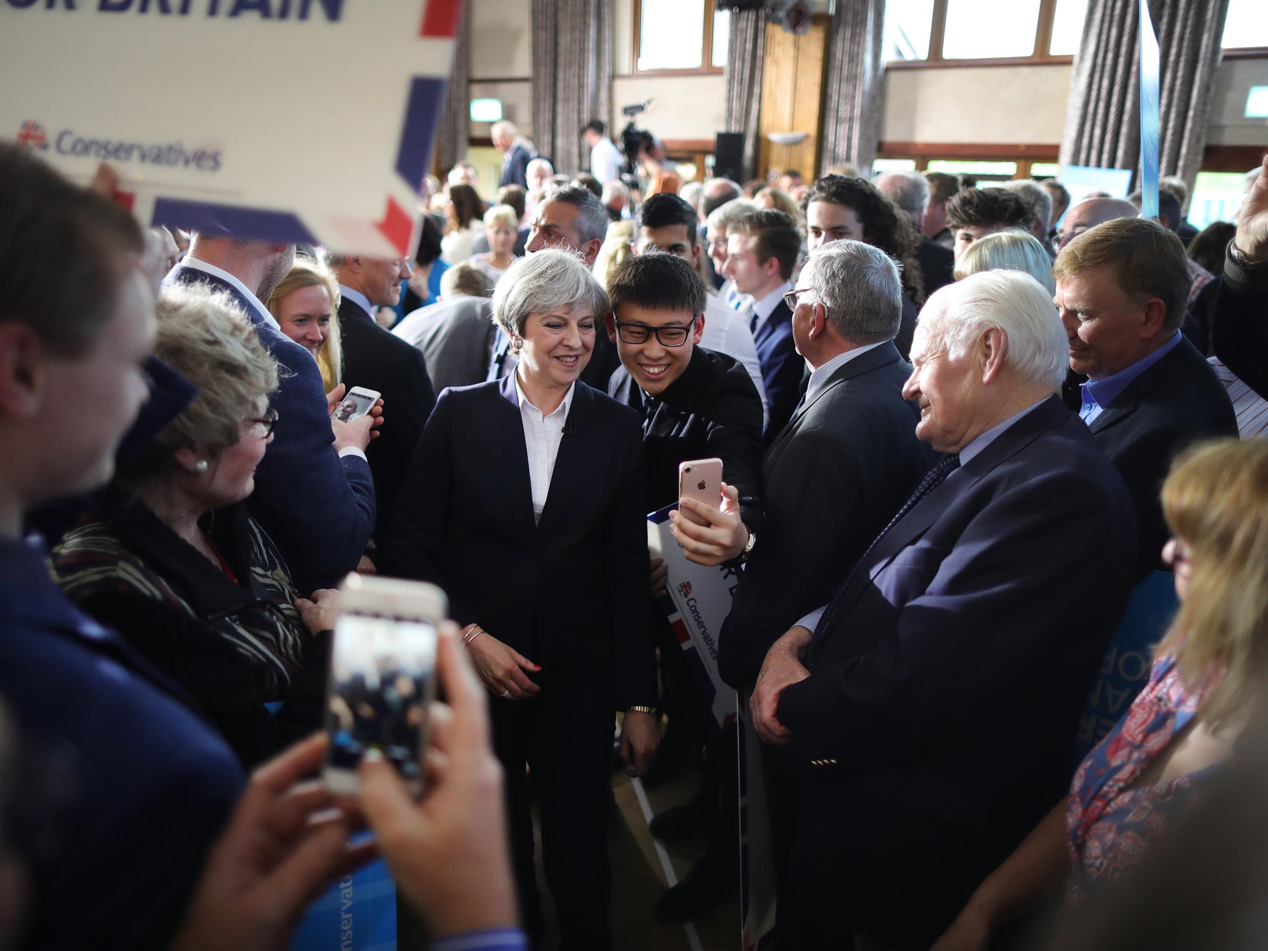 Even Theresa May gets stopped by fans for selfies