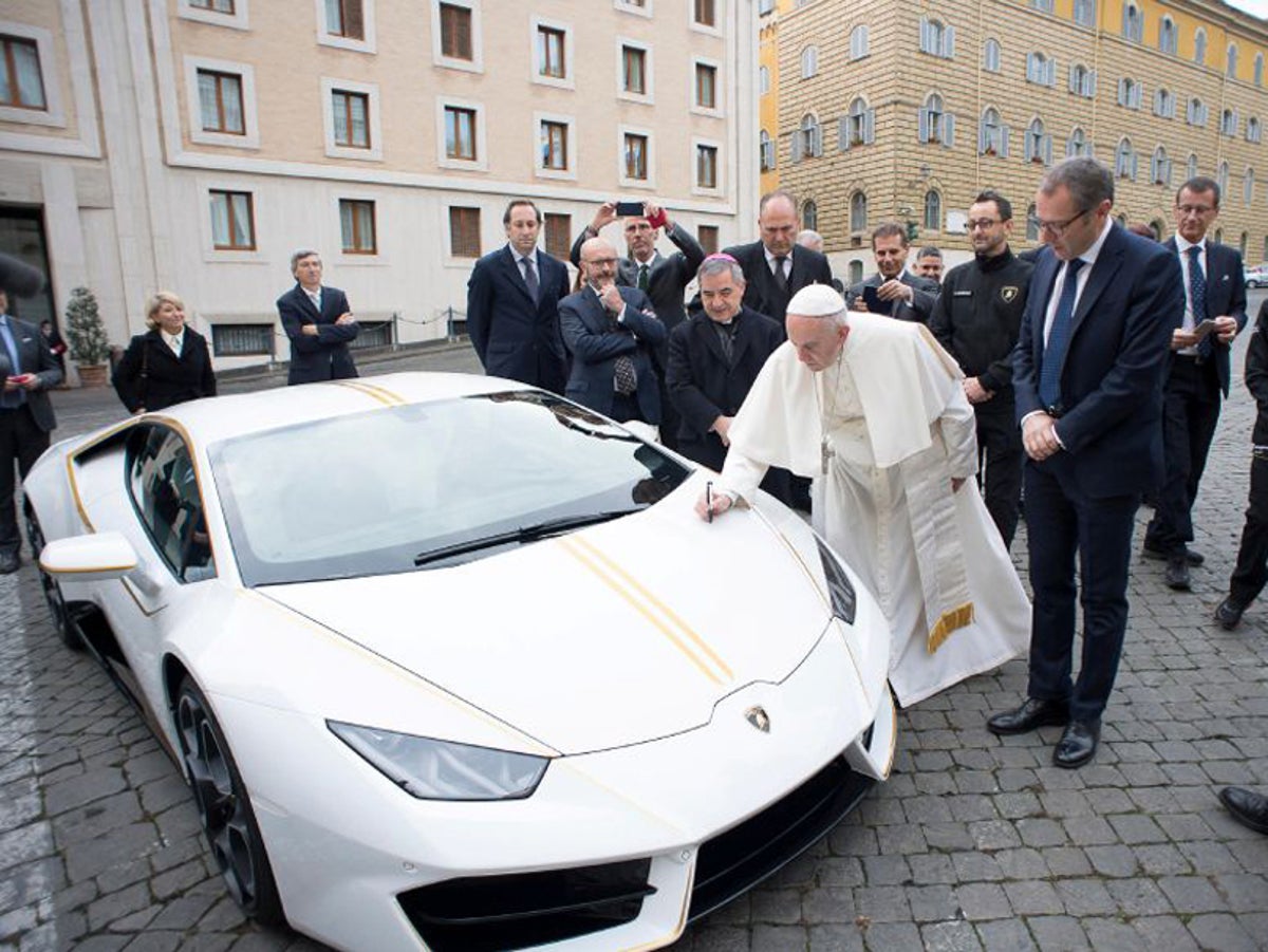 Signed, blessed, delivered: Pope Francis donates personalised Lamborghini  to charity after giving it holy touch | The Independent | The Independent