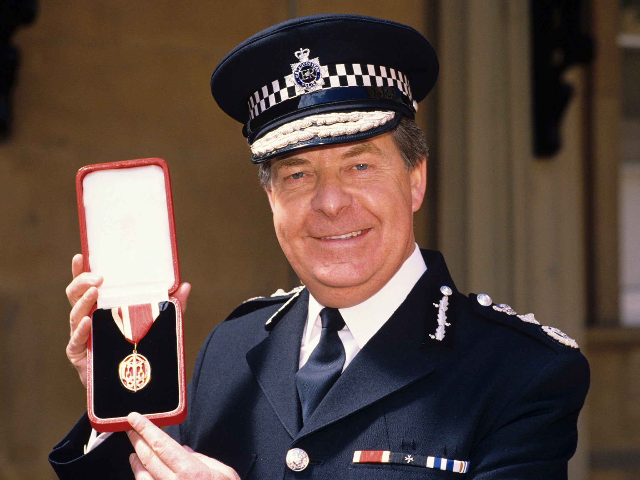 Imbert receives his knighthood in 1988 (Rex)