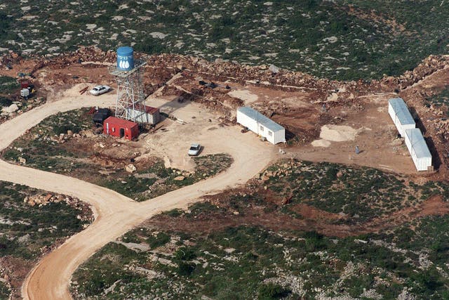 A file photo of the aerial view of Haresha, a Jewish settlement near Ramallah, during its construction on 12 April 1999