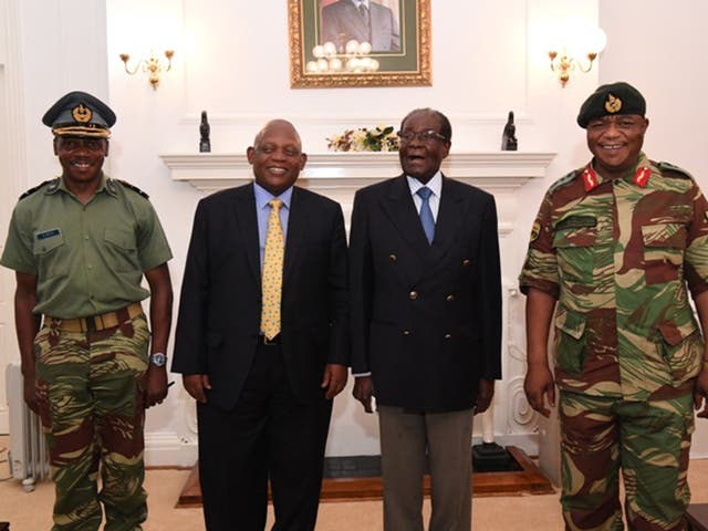 Robert Mugabe met with army commander General Constantino Chiwenga, right