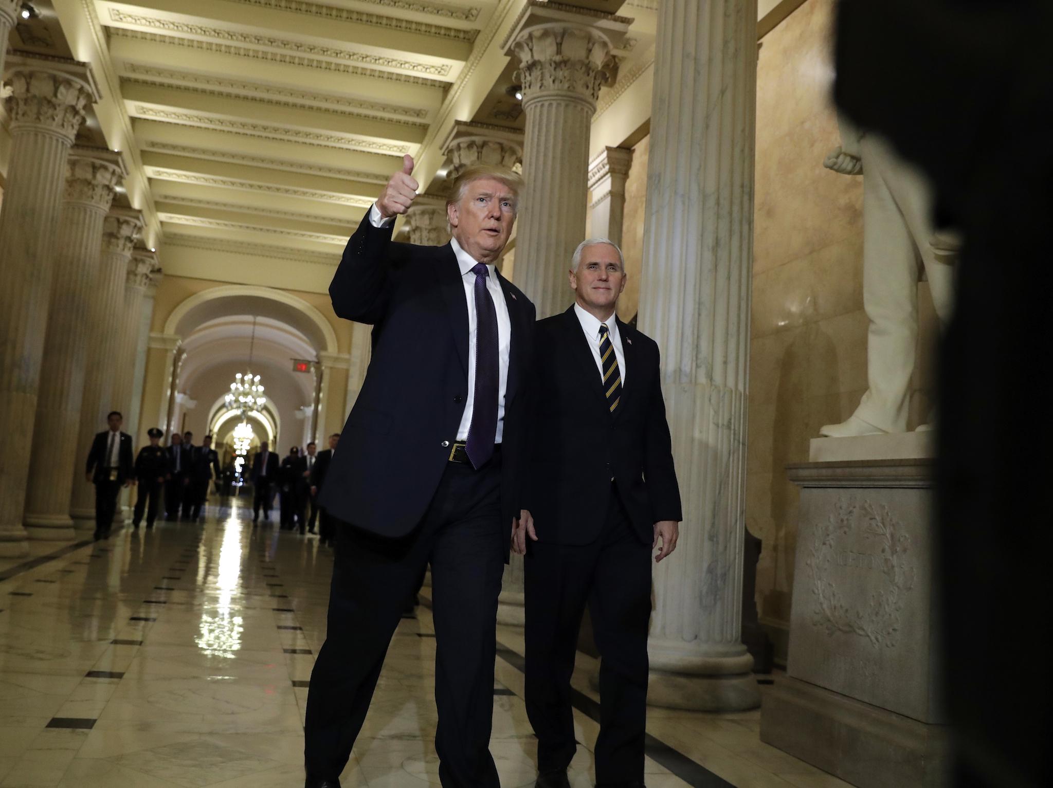 President Donald Trump leaves Capitol Hill after meeting with lawmakers on tax policy (AP Photo/Evan Vucci)