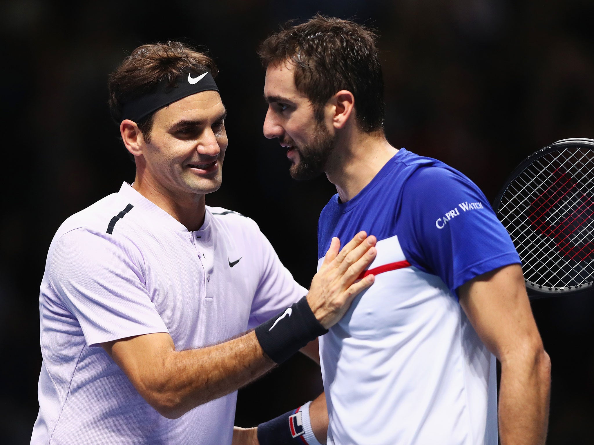 Federer with Cilic after securing victory