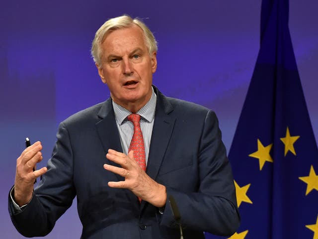 European Union's chief Brexit negotiator Michel Barnier gestures during a news conference