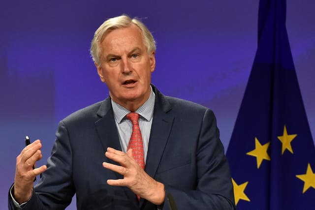 European Union's chief Brexit negotiator Michel Barnier gestures during a news conference