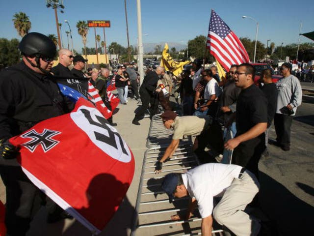 White supremacists retain a presence in California, as seen in this National Socialist Movement anti-illegal immigration rally on October 24, 2009 in Riverside, California.