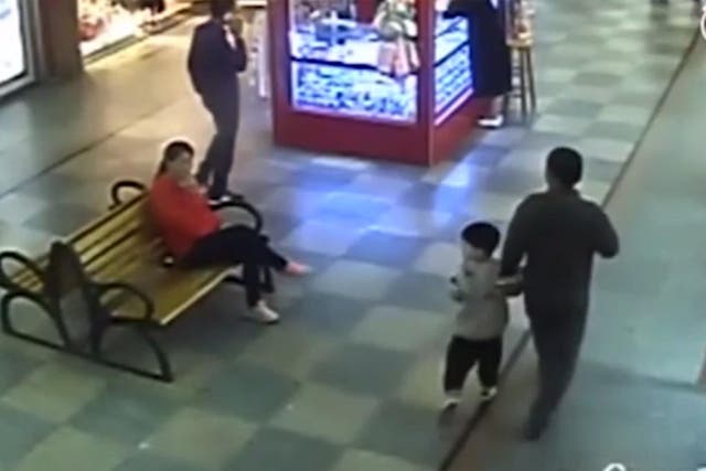 The moment the boy was in the shopping mall was captured on CCTV
