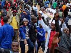 Huge crowds gather in Zimbabwe to call for Mugabe’s ouster