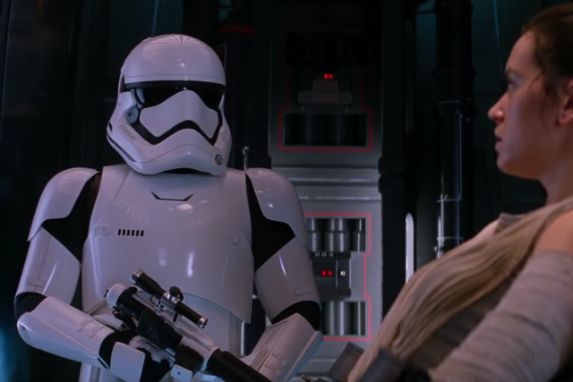 Rey uses the Force on a Stormtrooper (Daniel Craig) in Star Wars: The Force Awakens