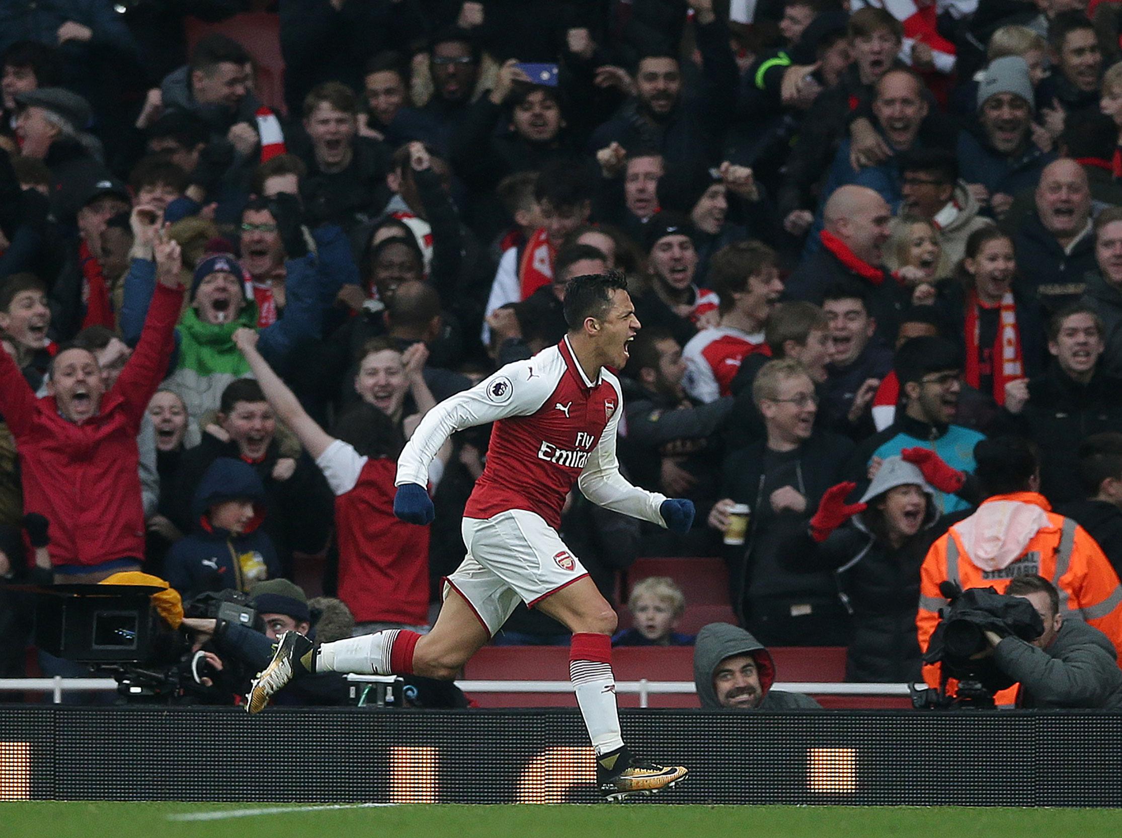 &#13;
Sanchez added a second as Arsenal earned the north London bragging rights &#13;