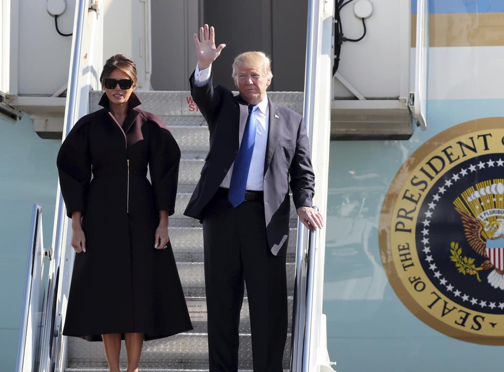 Melania and Donald Trump on the steps of Air Force One