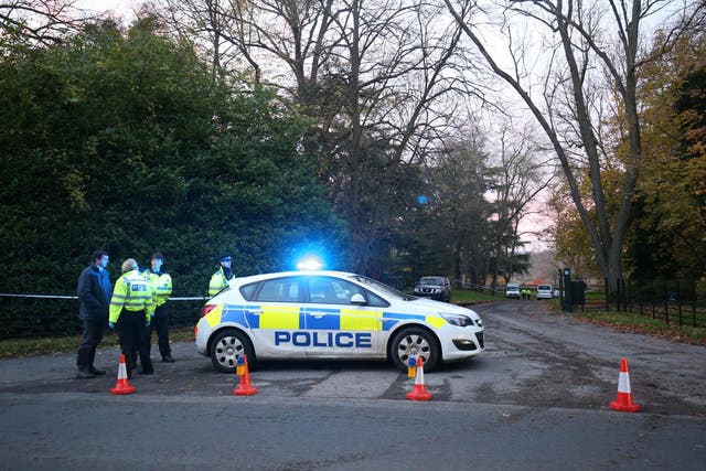 Police at the scene of the crash near Waddesdon, Buckinghamshire