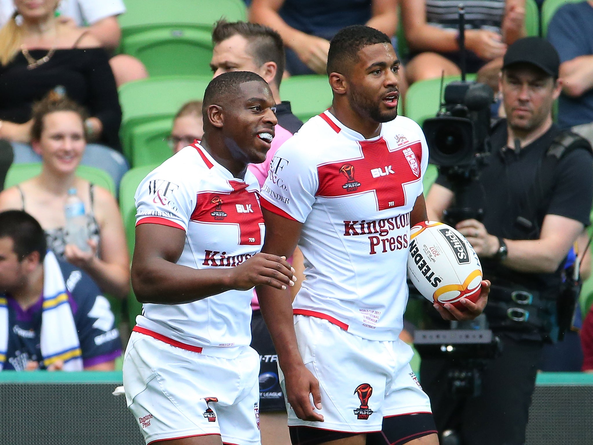 McGillvary celebrates with Kallum Watkins after the latter scored a try