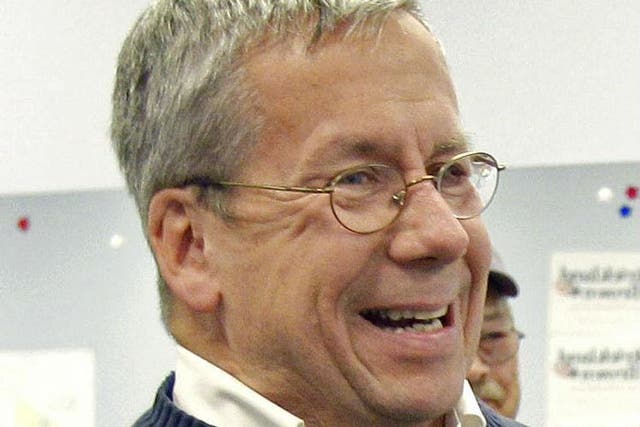 William O'Neill, an Ohio appeals court judge, laughs during a campaign stop in Mentor, Ohio