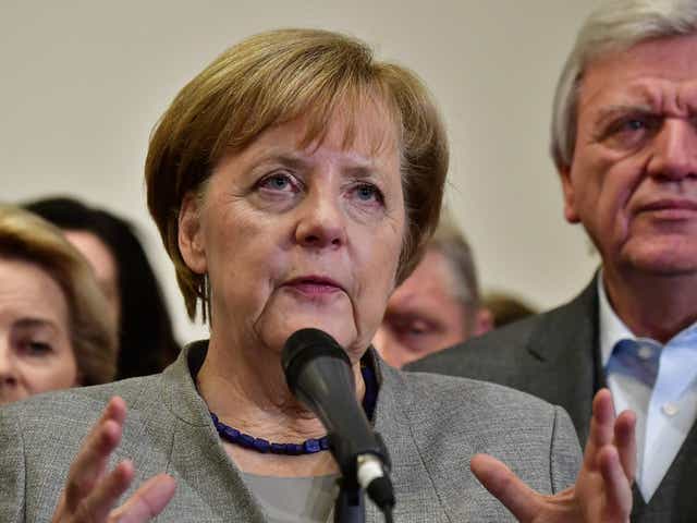 Angela Merkel speaks after exploratory talks on forming a new government broke down