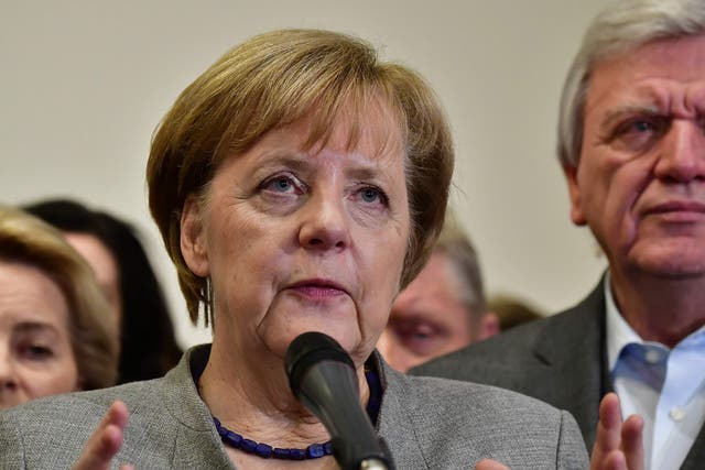 Angela Merkel speaks after exploratory talks on forming a new government broke down