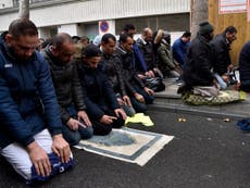 France to stop Muslims praying in the street, interior minister says