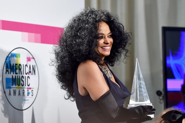Diana Ross holds her Lifetime Achievement Award at the AMAs in Los Angeles