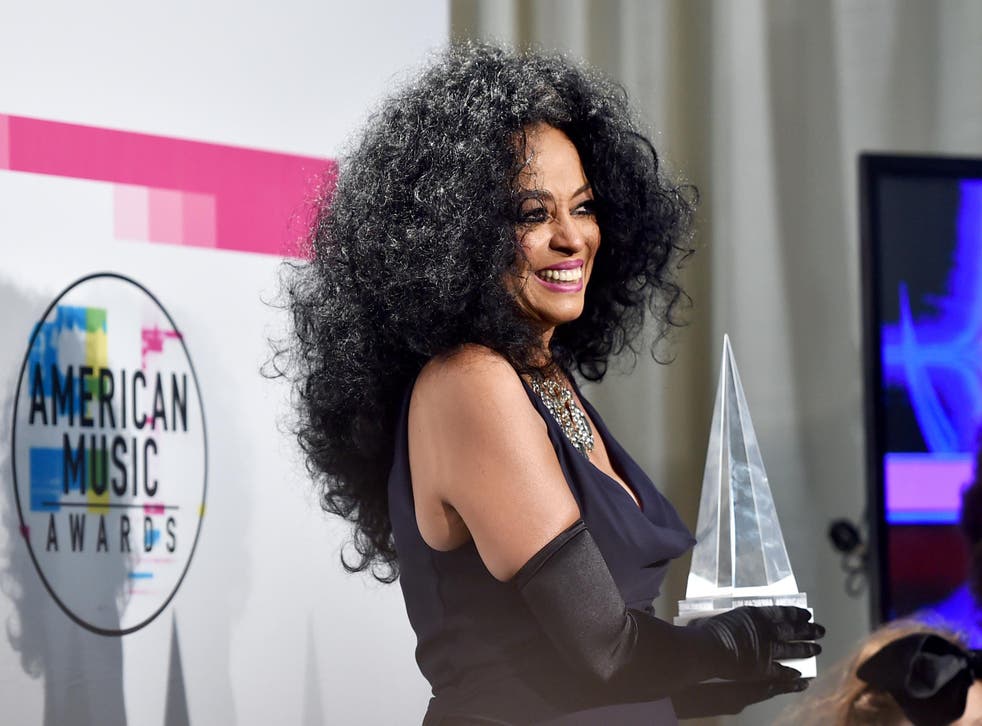 Diana Ross holds her Lifetime Achievement Award at the AMAs in Los Angeles