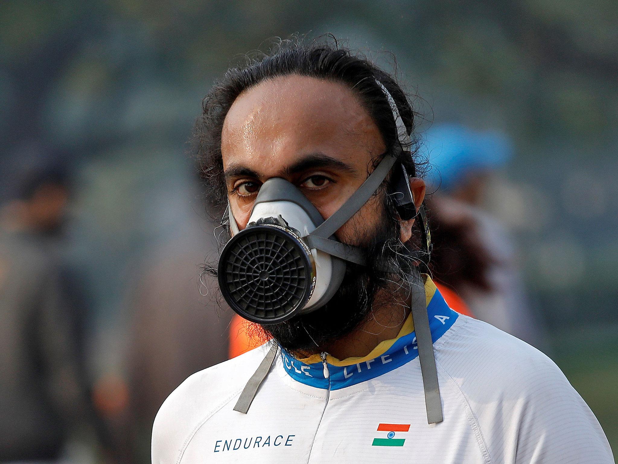 &#13;
A runner wearing a face mask takes part in marathon &#13;
