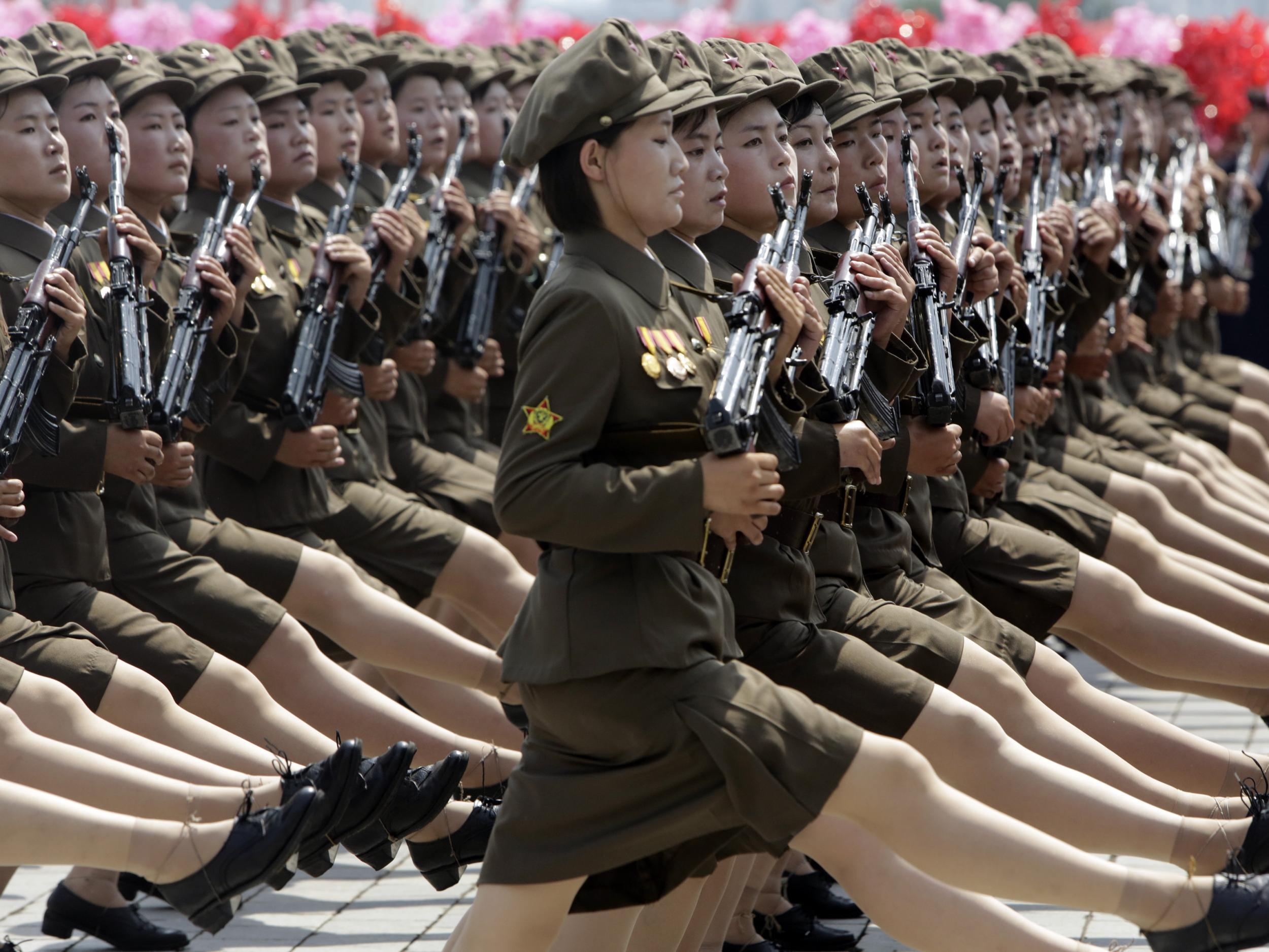 Female North Korean soldiers parade to mark the 60th anniversary of the signing of a truce in the 1950-53 Korean War at Kim Il-sung Square, in Pyongyang, 2013