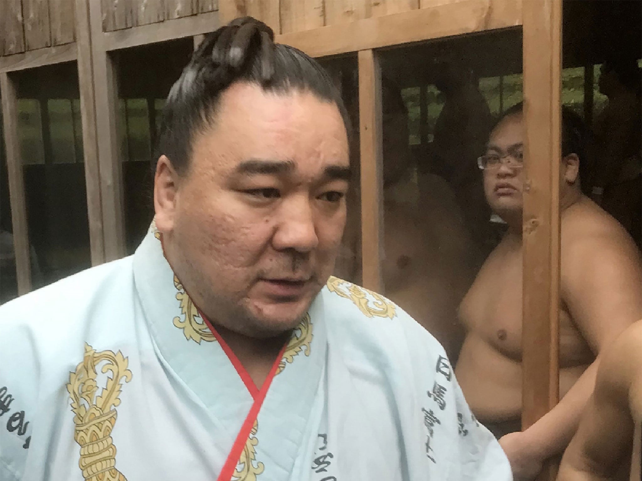 Mongolian 'yokozuna' Harumafuji issued an apology before the Japanese media, as officials said they were probing the incident