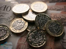 Pound sterling falls after UK economic growth forecast is slashed
