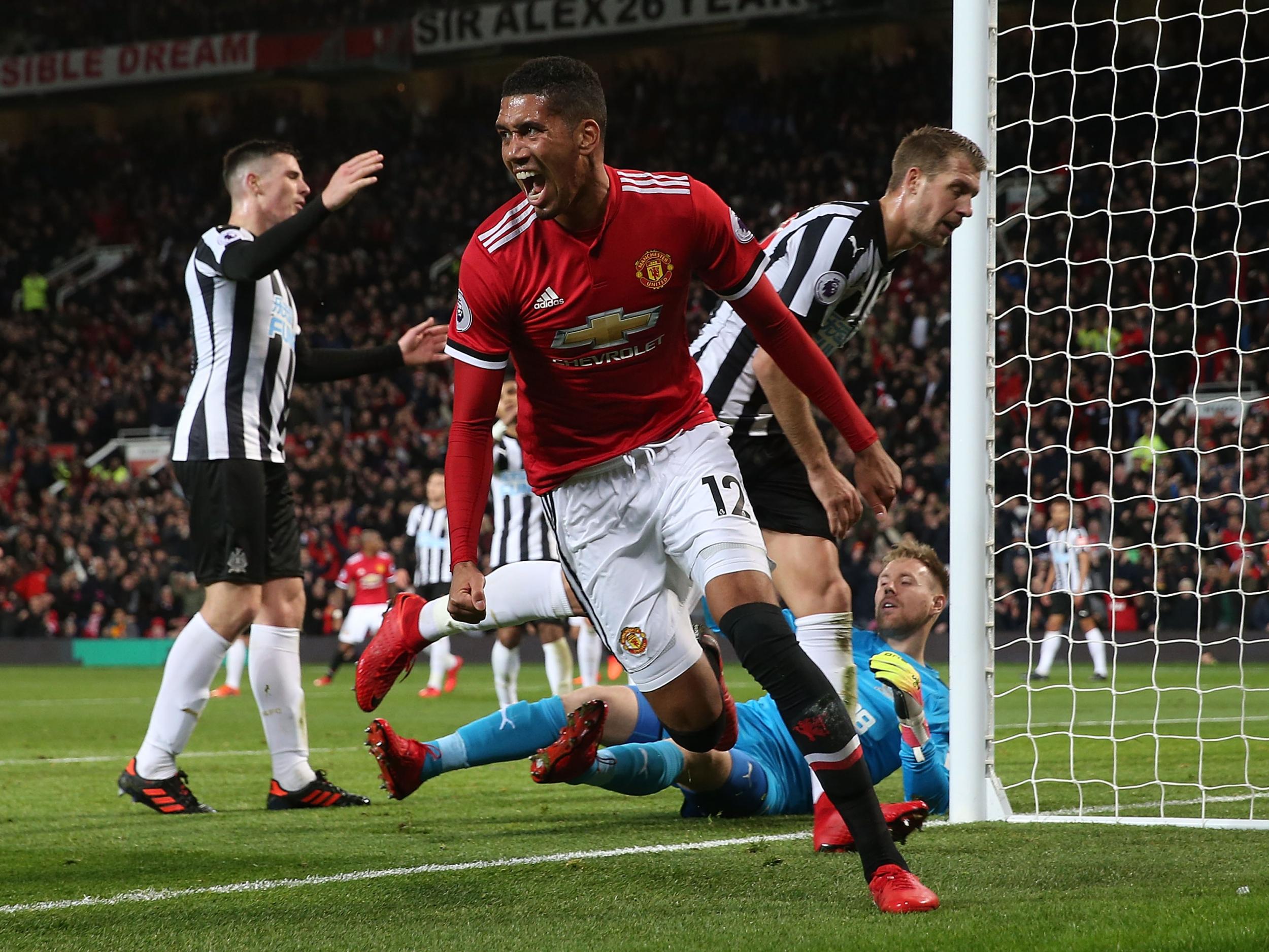 Chris Smalling celebrates his goal against Newcastle on Saturday