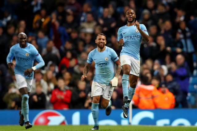 Raheem Sterling celebrates scoring the decisive goal in a tight game