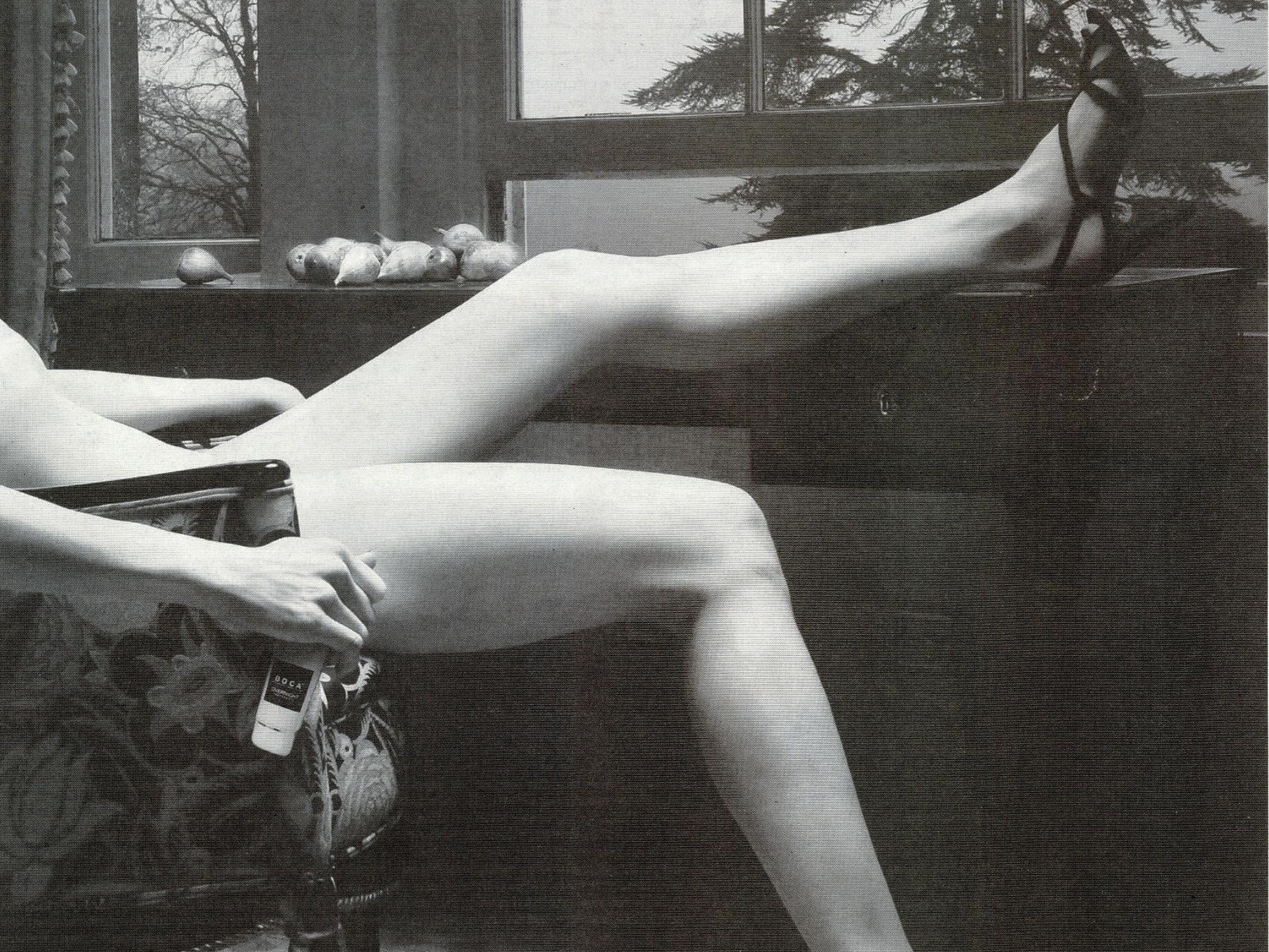 Banned advert featured black and white image of apparently naked woman wearing only a pair of strappy heels, reclining in a chair with one leg placed on top of a table and the other on the ground.
