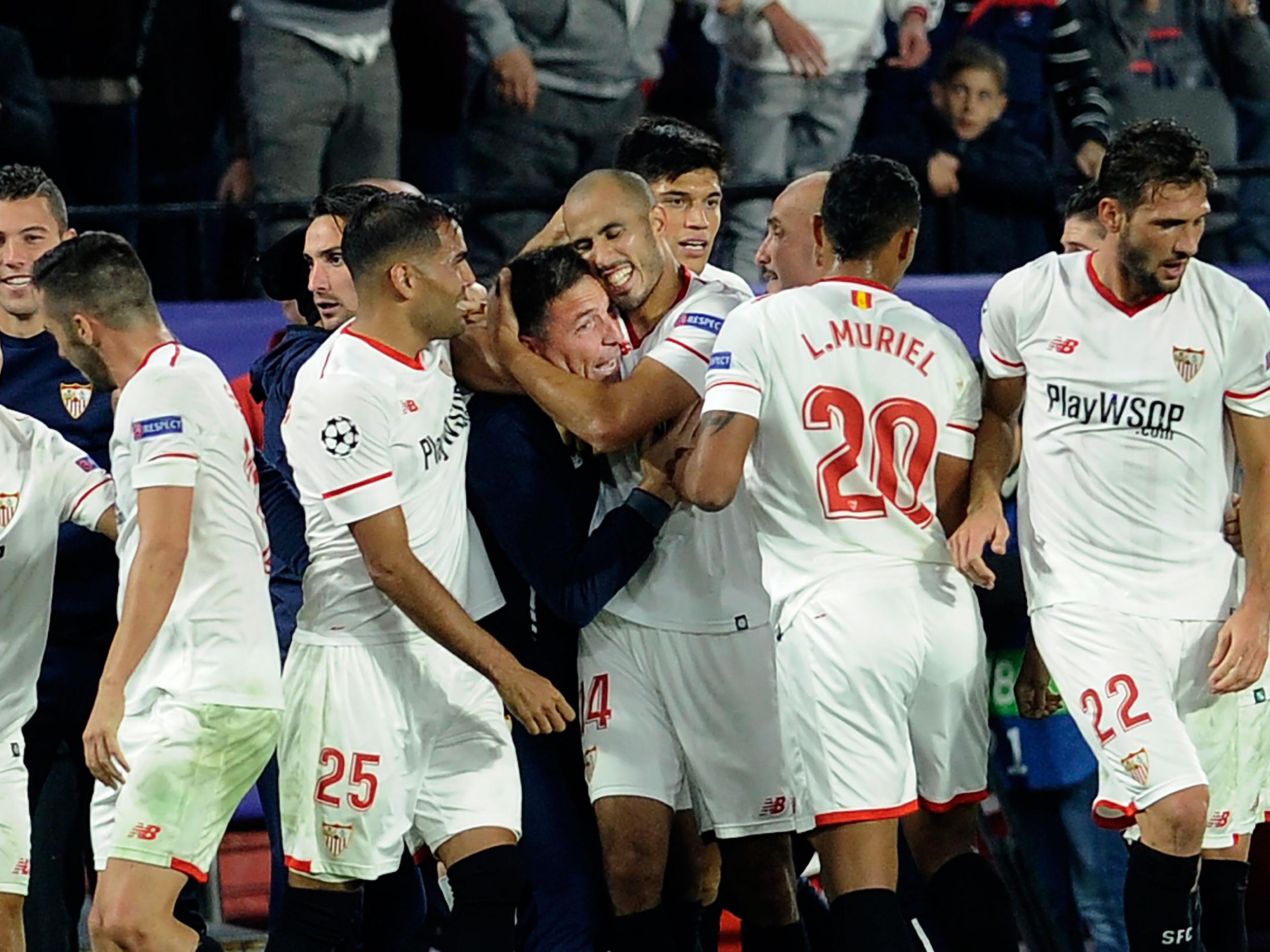 Sevilla's players celebrated with Eduardo Berizzo after equalising late on